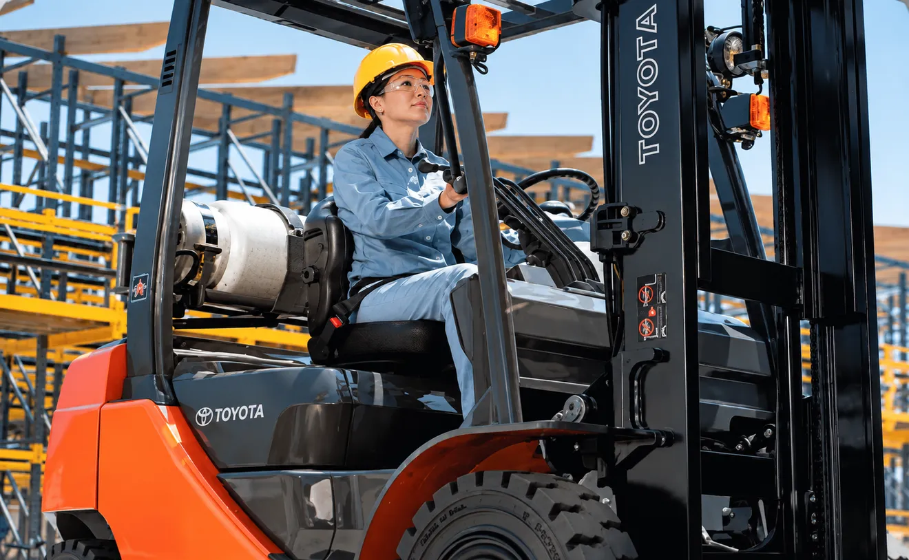 Toyota Material Handling associate operating a forklift