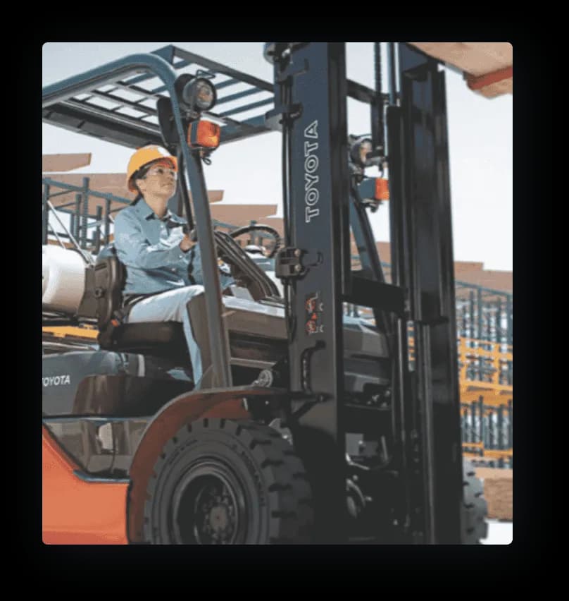 worker operating toyota forklift