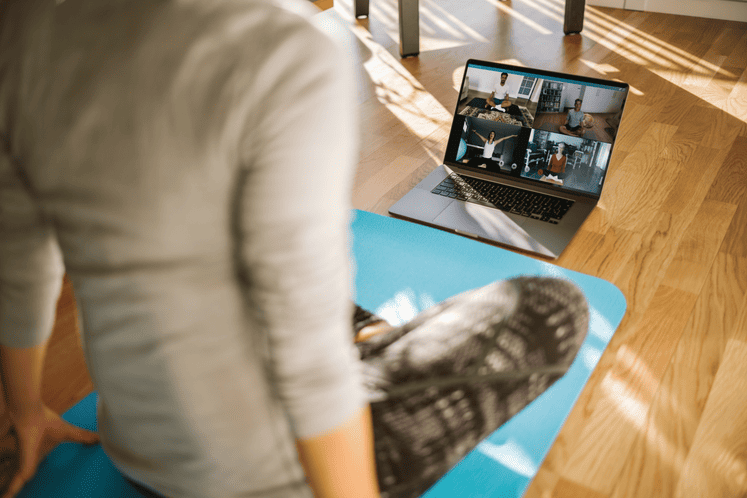 woman doing yoga while on call