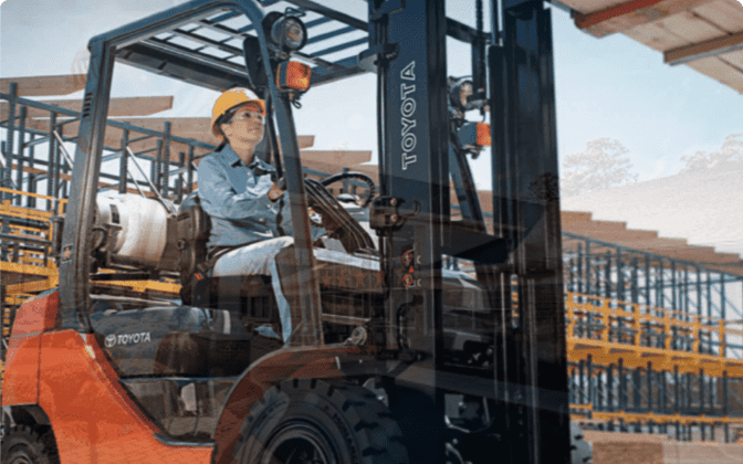 worker operating toyota forklift