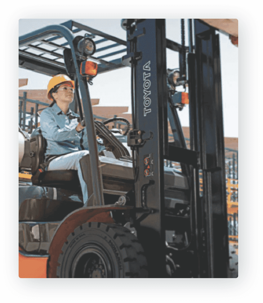worker operating toyota forklift