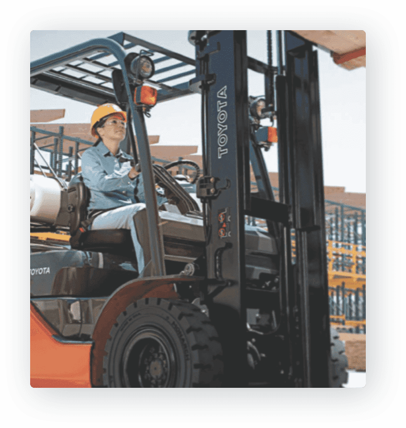 worker operating toyota forklift